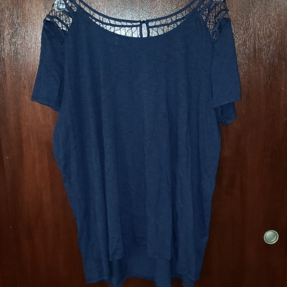 Blue blouse with lace accent.
